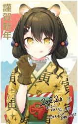 1girl 2022 :p :q animal_ears blush braid brown_gloves brown_hair chinese_zodiac crown_braid double_bun gloves green_sash hair_bun hand_up highres japanese_clothes kimono konogi_nogi looking_at_viewer nengajou new_year obi original sash smile solo tassel tiger_ears tongue tongue_out upper_body year_of_the_tiger yellow_eyes yellow_kimono