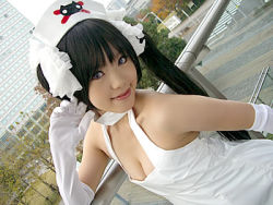 Rule 34 | 1girl, asian, black hair, bow, breasts, cleavage, cosplay, dutch angle, elbow gloves, gloves, hair bow, kipi-san, long hair, looking at viewer, lowres, nurse, outdoors, photo (medium), pure trance, ruriko nasu, ruriko nasu (cosplay), scissors, small breasts, smile, solo, twintails