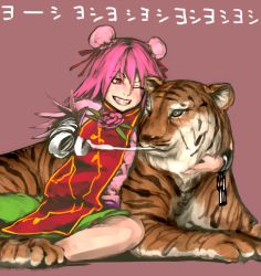 Rule 34 | 1girl, amputee, animal, animal ears, bandaged arm, bandages, bun cover, chain, chinese clothes, cuffs, double bun, envenomist (gengoroumaru), eyebrows, fangs, flower, green eyes, green skirt, grin, hair between eyes, hair bun, ibaraki kasen, indian style, looking at another, mouth hold, one eye closed, pink eyes, pink flower, pink hair, pink rose, red ribbon, ribbon, ribbon trim, rose, shackles, sharp teeth, short hair, simple background, sitting, skirt, smile, tabard, teeth, tiger, tiger ears, touhou, translation request