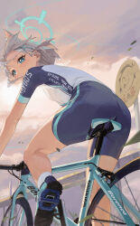 Rule 34 | 1girl, absurdres, animal ear fluff, animal ears, doodle sensei (blue archive), ass, bicycle, bike jersey, bike shorts, blue archive, blue eyes, blush, cloud, cloudy sky, cross hair ornament, cycling uniform, day, earrings, extra ears, from below, grey hair, hair ornament, halo, highres, jewelry, li-mi, looking at viewer, looking down, medium hair, mismatched pupils, official alternate costume, outdoors, parted lips, riding, riding bicycle, road bicycle, sensei (blue archive), shiroko (blue archive), shiroko (cycling) (blue archive), shoes, short sleeves, sky, sneakers, socks, solo, sweat, white socks, wolf ears