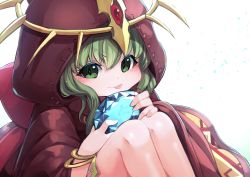 Rule 34 | 1girl, bracelet, closed mouth, fire emblem, fire emblem: mystery of the emblem, fire emblem heroes, green eyes, green hair, highres, holding, hood, hood up, jewelry, knees up, nakabayashi zun, nintendo, simple background, solo, stone, tiara, tiki (fire emblem), tiki (young) (fire emblem), tongue, tongue out, white background