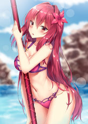 Rule 34 | 1girl, arched back, bikini, blurry, blurry background, blush, breasts, cleavage, commentary request, cowboy shot, day, eyes visible through hair, fate/grand order, fate (series), flower, hair flower, hair intakes, hair ornament, holding, holding weapon, legs together, long hair, looking at viewer, medium breasts, navel, outdoors, parted lips, polearm, purple bikini, purple eyes, purple hair, rong yi tan, scathach (fate), solo, standing, stomach, swimsuit, very long hair, water, weapon
