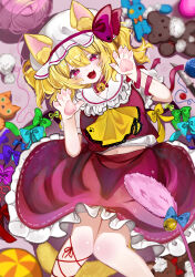 Rule 34 | 1girl, absurdres, animal ears, ascot, ball, blonde hair, blurry, blurry background, cat ears, commentary, flandre scarlet, frilled skirt, frills, hat, hat ribbon, highres, leg ribbon, looking at viewer, mob cap, navel, one side up, open mouth, paw print, red eyes, red skirt, ribbon, samon (vxxr8575), short hair, skirt, solo, stuffed animal, stuffed cat, stuffed rabbit, stuffed toy, teddy bear, touhou, white hat, wings, yarn, yarn ball, yellow ascot