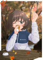 Rule 34 | absurdres, akiyama yukari, autumn, blush, border, brown eyes, brown hair, coffee, colombia, cup, drinking, girls und panzer, highres, holding, holding cup, holding leaf, jacket, leaf, maikaooba, maple leaf, one eye closed, photo background, short hair, table, track jacket, white border, wooden table