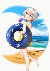 Rule 34 | absurdres, bare legs, bare shoulders, beach, blue eyes, blue innertube, bright pupils, cloud, cloudy sky, commentary request, crescent, cup, drink, drinking, drinking straw, expressionless, grey hair, hair between eyes, hair ornament, hairclip, highres, holding, holding cup, holding swim ring, innertube, laitochris, leg up, looking at viewer, looking to the side, paw print, rurine luna, sand, short hair, skirt, sky, spanish commentary, swim ring, swimsuit, virtual youtuber, wactor production, walking, white pupils, yellow skirt