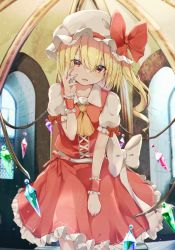 Rule 34 | 1girl, ascot, blonde hair, blurry, blurry background, blush, bow, collarbone, commentary request, corset, crystal, drill hair, feet out of frame, flandre scarlet, hair between eyes, hand on own cheek, hand on own face, hand up, hat, hat bow, head tilt, highres, indoors, iyo (ya na kanji), light particles, looking at viewer, mob cap, one side up, parted lips, petticoat, puffy short sleeves, puffy sleeves, red bow, red eyes, red skirt, red vest, short hair, short sleeves, skirt, smile, solo, standing, touhou, vest, white bow, white hat, window, wing collar, wings, wrist cuffs, yellow ascot
