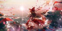 Rule 34 | 1girl, bow, brown hair, cloud, cowboy shot, day, detached sleeves, floating hair, from behind, hair bow, hakurei reimu, highres, holding, leaf, lens flare, light trail, long hair, long skirt, outdoors, petals, red bow, red ribbon, red shirt, red skirt, ribbon, ribbon-trimmed skirt, ribbon-trimmed sleeves, ribbon trim, rokusai, shirt, skirt, solo, standing, sunlight, touhou, very long hair