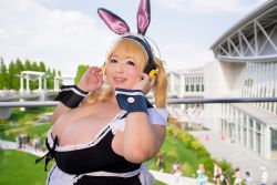Rule 34 | 1girl, asian, blonde hair, breasts, brown eyes, cleavage, cosplay, fat, headphones, highres, hoshima mika, huge breasts, jewelry, necklace, nitroplus, photo (medium), solo, star (symbol), super pochaco, super pochaco (cosplay), twintails