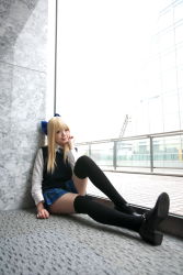 Rule 34 | 1girl, asian, black footwear, black thighhighs, blonde hair, blue eyes, blue ribbon, blurry, bow, breasts, character request, color contacts, cosplay, depth of field, dress shirt, hair bow, head rest, high heels, highres, indoors, looking at viewer, mary janes, miniskirt, namada, on floor, photo (medium), plaid, plaid skirt, pleated skirt, ribbon, rug, school uniform, shirt, shoes, sitting, skirt, small breasts, solo, sweater vest, thighhighs, white shirt, window, zettai ryouiki