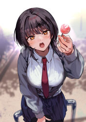 black_hair black_pantyhose blue_skirt blurry blurry_background blush breasts brown_eyes candy choppy_bangs collared_shirt commentary_request food from_above grey_hoodie hair_intakes holding holding_candy holding_food hood hood_down hoodie incoming_food konbu_wakame large_breasts light_blush looking_at_viewer medium_hair necktie open_clothes open_hoodie open_mouth original outdoors pantyhose pleated_skirt red_necktie road school_uniform shirt sitting skirt solo twitter_username white_shirt