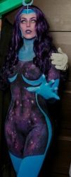 Rule 34 | 1girl, bodysuit, cosplay, long hair, looking at viewer, lowres, misssinister, photo (medium), purple hair, rick and morty, solo, space, spandex, supernova (rick and morty)