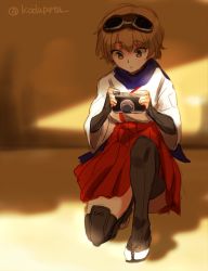 Rule 34 | 1girl, bad id, bad twitter id, brown eyes, brown hair, camera, goggles, goggles on head, hakama, hakama short skirt, hakama skirt, holding, holding camera, japanese clothes, katou keiko, kneeling, kodamari, looking down, red skirt, short hair, skirt, solo, strike witches, tabi, twitter username, world witches series