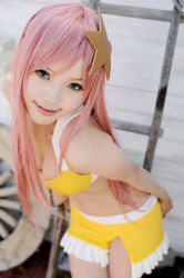 Rule 34 | 1girl, asian, bikini, blue eyes, breasts, cleavage, color contacts, cosplay, dutch angle, gundam, gundam seed, kipi-san, leaning forward, long hair, looking at viewer, meer campbell, meer campbell (cosplay), mole, outdoors, photo (medium), pink hair, solo, swimsuit, yellow bikini