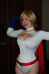 Rule 34 | 1girl, absurdres, belt, blonde hair, breasts, cape, cleavage, cleavage cutout, clothing cutout, cosplay, dc comics, gloves, highres, leotard, photo (medium), power girl, power girl (cosplay)