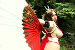 Rule 34 | breasts, brown eyes, brown hair, chouzuki maryou, cosplay, hand fan, hair ornament, hanging breasts, large breasts, leaning forward, long hair, photo (medium), plump, ponytail, shiranui mai, shiranui mai (cosplay), sideboob, snk, the king of fighters, thick thighs, thighs, very long hair