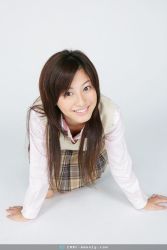 Rule 34 | 00s, 1girl, 2007, all fours, asian, brown hair, cosplay, indoors, long hair, looking at viewer, miniskirt, photo (medium), plaid, plaid skirt, pleated skirt, school uniform, skirt, solo, sugimoto yumi, sweater vest, watermark, web address