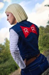 Rule 34 | 1girl, android 18, blonde hair, cosplay, dragon ball, dragonball z, photo (medium), red ribbon army, solo