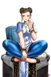 Rule 34 | baozi, black hair, blue pants, bracelet, capcom, chest cutout, chinese clothes, chun-li, double bun, eating, finalcake, food, hair bun, hair ribbon, highres, indian style, jewelry, looking to the side, pants, ribbon, simple background, sitting, street fighter, street fighter 6, white background