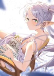 Rule 34 | 1girl, bare arms, bare shoulders, book, breasts, chair, collarbone, earrings, frieren, from side, green eyes, grey hair, highres, holding, holding book, jewelry, long hair, looking at viewer, motto notto, open book, pointy ears, sitting, small breasts, solo, sousou no frieren, twintails