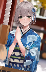 Rule 34 | 1girl, blue flower, blue kimono, blurry, blurry background, blush, closed mouth, commentary request, floral print, flower, green eyes, hair flower, hair ornament, hands up, highres, hololive, japanese clothes, kimono, long sleeves, looking at viewer, niii (memstapak), obi, own hands together, print kimono, sash, shirogane noel, shirogane noel (new year), short hair, silver hair, smile, solo, upper body, virtual youtuber, white flower