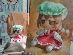 Rule 34 | 1girl, :&lt;, absurdres, animal ears, blurry, blurry background, bow, bowtie, brown eyes, cat ears, cat girl, cat tail, character doll, chen, closed mouth, commentary, doll, dress, earrings, frilled dress, frills, fumo (doll), green hat, hat, highres, jewelry, jitome, long sleeves, medium hair, mob cap, multiple tails, nekomata, no nose, oil painting (medium), painting (medium), painting (object), photo (medium), pinafore dress, portrait (object), red dress, shirt, single earring, sitting, sleeveless, sleeveless dress, socks, solo, tail, touhou, traditional media, two tails, white bow, white bowtie, white shirt, white socks, yuuren kyouko