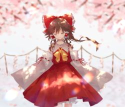 Rule 34 | bad id, bad pixiv id, bow, branch, brown hair, cherry blossoms, closed mouth, commentary request, cowboy shot, detached sleeves, facing viewer, frilled hair tubes, frills, grey background, hair bow, hair tubes, hakurei reimu, highres, long hair, long sleeves, neck ribbon, nekonabe (na be123), petals, ponytail, red bow, red shirt, red skirt, ribbon, rope, shide, shimenawa, shirt, skirt, solo, touhou, wide sleeves, yellow ribbon