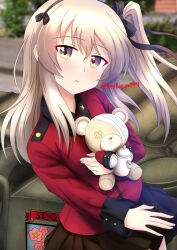 Rule 34 | 1girl, black ribbon, black skirt, boko (girls und panzer), brown eyes, commentary, day, emblem, girls und panzer, girls und panzer saishuushou, hair ribbon, head tilt, highres, holding, holding stuffed toy, jacket, light brown hair, long hair, long sleeves, looking at viewer, military uniform, military vehicle, miniskirt, motor vehicle, on vehicle, one side up, outdoors, parted lips, pleated skirt, red jacket, redbaron, ribbon, shimada arisu, skirt, solo, spoilers, st. gloriana&#039;s (emblem), st. gloriana&#039;s military uniform, standing, stuffed animal, stuffed toy, tank, teapot, teddy bear, twitter username, uniform
