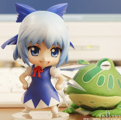 Rule 34 | 1girl, blue dress, blue eyes, blue hair, cirno, computer, crystal, dress, female focus, figure, frog, hands on own hips, lowres, matching hair/eyes, nendoroid, no humans, photo (medium), ribbon, smile, solo, standing, touhou