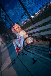 Rule 34 | 1girl, absurdres, bench, blonde hair, city, cloud, cosplay, dutch angle, fence, highres, kaname madoka, kaname madoka (cosplay), lana rain, magical girl, mahou shoujo madoka magica, night, outdoors, park, photo (medium), plant, self-upload, shoes, sitting, sky, solo, tree, twintails, white legwear