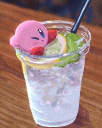 Rule 34 | ;o, blue eyes, blurry, blurry background, blush stickers, bubble, colored skin, cup, disposable cup, drink, drinking straw, highres, ice, ice cube, kirby, kirby (series), leaf, lemon squash, miclot, nintendo, no humans, on food, one eye closed, parted lips, pink skin, red footwear, shadow, shoes, solo, table