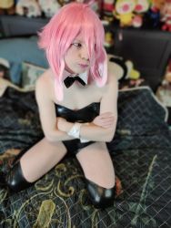 Rule 34 | 1boy, animal costume, animal ears, ansel (arknights), arknights, bed, belialssin, cosplay, crossdressing, crossed arms, fake animal ears, highres, latex, leotard, photo (medium), pink hair, playboy bunny, pout, rabbit ears, real life, shiny clothes, solo, thighhighs, trap