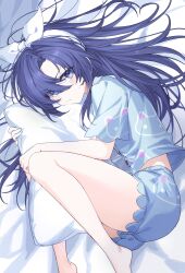 1girl absurdres animal_print b_soyo1 blue_archive blue_pajamas blue_shirt blue_shorts blush cat_print hair_between_eyes hair_ribbon highres hugging_object long_hair looking_at_viewer lying on_bed on_side pajamas pillow pillow_hug purple_eyes purple_hair ribbon shirt shorts sweatdrop white_ribbon yuuka_(pajamas)_(blue_archive)