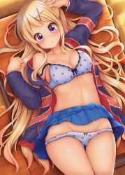 Rule 34 | 1girl, arm up, bare shoulders, blonde hair, blue bra, blue jacket, blue panties, blue skirt, blush, bow, bow bra, bow panties, bra, breasts, cleavage, clothes lift, collarbone, commentary request, desk, flag print, groin, hair ornament, hair spread out, hairclip, highres, indoors, jacket, kin-iro mosaic, kujou karen, long hair, long sleeves, lying, medium breasts, minato ojitan, on back, on desk, open clothes, open jacket, panties, panty pull, parted lips, pleated skirt, print jacket, purple eyes, revision, school desk, skirt, skirt lift, solo, underwear, union jack, very long hair, wooden floor, x hair ornament