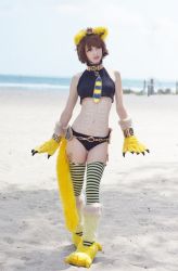 Rule 34 | 1girl, animal ears, animal hands, beach, bodypaint, cat ears, cat paws, cat tail, cosplay, egyptian, grey eyes, highres, lion ears, lion paws, lion tail, megan coffey, monster girl, monster girl encyclopedia, ocean, personification, real life, revealing clothes, solo, sphinx, sphinx (monster girl encyclopedia), tail