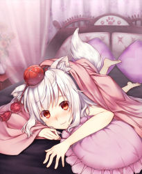 Rule 34 | 1girl, :3, animal ears, bad id, bad nicoseiga id, barefoot, bed, blanket, blush, female focus, frilled pillow, frills, hat, inubashiri momiji, looking at viewer, lying, on stomach, pillow, red eyes, short hair, silver hair, sleeveless, solo, sugimeno, tail, tokin hat, touhou, wolf ears, wolf tail