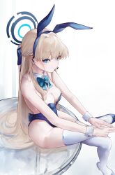 Rule 34 | 1girl, absurdres, animal ears, bare shoulders, blonde hair, blue archive, blue eyes, blue leotard, breasts, cleavage, closed mouth, commentary, detached collar, earpiece, fake animal ears, hair ribbon, highleg, highleg leotard, highres, leotard, long hair, looking at viewer, megu (pixiv9460065), official alternate costume, playboy bunny, rabbit ears, ribbon, sitting, small breasts, solo, strapless, strapless leotard, thighhighs, toki (blue archive), toki (bunny) (blue archive), very long hair, white thighhighs, wrist cuffs