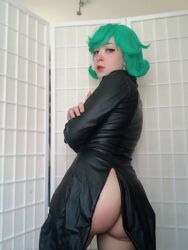 Rule 34 | 1girl, ass, bare legs, blurry, blurry background, brazilian (nationality), cosplay, female focus, green eyes, green hair, highres, indoors, looking at viewer, looking back, nerokosplayer, no panties, one-punch man, photo (medium), short hair, solo, tatsumaki