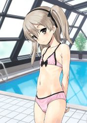 Rule 34 | 10s, 1girl, arms behind back, bikini, black hairband, brown eyes, child, commentary request, flat chest, girls und panzer, groin, hairband, indoors, jiji (aardvark), light brown hair, long hair, looking at viewer, navel, over sized clothes, pink bikini, plant, pool, rei no pool, shimada arisu, side ponytail, smile, solo, swimsuit