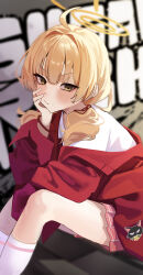 Rule 34 | 1girl, absurdres, ahoge, blonde hair, blue archive, blush, bracelet, closed mouth, gubbi on, halo, hand on own chest, highres, jacket, jewelry, long sleeves, looking at viewer, medium hair, official alternate costume, pink skirt, red jacket, sitting, skirt, socks, solo, thighs, twintails, white socks, yellow eyes, yellow halo, yoshimi (band) (blue archive), yoshimi (blue archive)