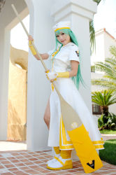 Rule 34 | 1girl, alice carroll, alice carroll (cosplay), aria (manga), asian, blue eyes, boots, color contacts, cosplay, fingerless gloves, gloves, green hair, hat, kipi-san, long hair, looking at viewer, mole, oar, outdoors, palm tree, photo (medium), sailor collar, solo, tree, undine, uniform