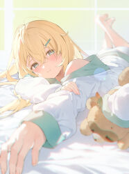 Rule 34 | 1girl, blonde hair, blue eyes, blush, closed mouth, hair between eyes, hair ornament, hairclip, hana mori, hand on own arm, highres, hololive, kazama iroha, long hair, looking at viewer, loose clothes, lying, on bed, on stomach, outstretched arm, pokobee, virtual youtuber