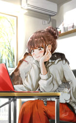 1girl, air conditioner, animal, animal collar, animal on lap, animal on shoulder, arm rest, bangs, blurry, blurry background, blush, brown eyes, brown hair, cat, cat on lap, cat on shoulder, collar, commentary request, computer, elbows on table, electric socket, eyebrows visible through hair, feet out of frame, grey hoodie, hair bun, hand on own face, head rest, highres, hood, hood down, hoodie, indoors, kitten, laptop, looking down, orange skirt, original, picture (object), shelf, signature, sitting, skirt, smile, solo, soragane (banisinngurei), table, wide-eyed
