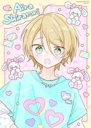 Rule 34 | 1boy, blonde hair, blush, character name, ensemble stars!, green eyes, green shirt, heart, highres, jewelry, long sleeves, looking at viewer, male focus, manamoko (fancy surprise!), necklace, open mouth, pink background, shiratori aira (ensemble stars!), shirt, short hair, short sleeves, solo, star (symbol), stuffed animal, stuffed rabbit, stuffed toy, white shirt, yellow background
