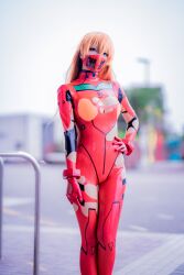 Rule 34 | 1girl, absurdres, asian, blue eyes, bodysuit, breasts, brown hair, cosplay, evangelion: 3.0+1.0 thrice upon a time, hair down, hand on own hip, highres, japanese (nationality), long hair, long sleeves, looking at viewer, mask, medium breasts, mouth mask, multicolored bodysuit, multicolored clothes, neo.omochi, neon genesis evangelion, photo (medium), pilot suit, plugsuit, rebuild of evangelion, red bodysuit, shiny clothes, sky, smile, souryuu asuka langley, souryuu asuka langley (cosplay), standing, torn bodysuit, torn clothes, very long hair