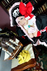 Rule 34 | 1girl, banana, breasts, captain liliana, captain liliana (cosplay), chouzuki maryou, cosplay, food, fruit, hat, highres, large breasts, photo (medium), pink hair, pirate, pirate hat, plump, purple eyes, queen&#039;s blade, queen&#039;s blade lost worlds, queen&#039;s blade rebellion, sexually suggestive