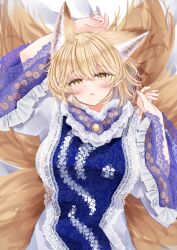 Rule 34 | 1girl, :o, animal ears, bed sheet, blonde hair, blue tabard, blush, breasts, dress, fox ears, fox girl, fox tail, highres, lace-trimmed sleeves, lace trim, large breasts, looking at viewer, lying, multiple tails, no headwear, on back, sarasadou dan, solo, tabard, tail, touhou, white dress, yakumo ran, yellow eyes