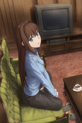 Rule 34 | 1girl, aozaki aoko, black pants, blue eyes, blue sweater, breasts, brown hair, couch, cup, hair intakes, indoors, kamo ashi, long hair, long sleeves, looking at viewer, mahou tsukai no yoru, medium breasts, on couch, pants, ribbed sweater, shadow, sitting, sleeves past wrists, solo, sweater, table, teacup, television, turtleneck, turtleneck sweater
