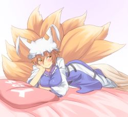 Rule 34 | 1girl, bad id, bad pixiv id, blonde hair, blush, breasts, brown eyes, head rest, fox tail, hat, large breasts, lying, multiple tails, nahu, on stomach, pillow, short hair, smile, solo, tail, touhou, yakumo ran, yes, yes-no pillow