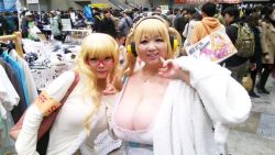 Rule 34 | 2girls, asian, blonde hair, breasts, brown eyes, cleavage, cosplay, fat, headphones, hoshima mika, huge breasts, jewelry, multiple girls, necklace, nitroplus, photo (medium), star (symbol), super pochaco, super pochaco (cosplay), twintails