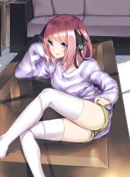 Rule 34 | absurdres, black ribbon, blue eyes, blunt bangs, breasts, butterfly hair ornament, collarbone, feet out of frame, go-toubun no hanayome, green shorts, hair ornament, hand on own cheek, hand on own face, highres, indoors, leg up, looking at viewer, lying, multicolored nails, nail polish, nakano nino, on side, pink hair, ribbon, sahara386, shorts, sleeves past wrists, smile, solo, striped clothes, striped sweater, sweater, table, thighhighs, thighs, tongue, tongue out, twintails, vertical stripes, white thighhighs, zettai ryouiki
